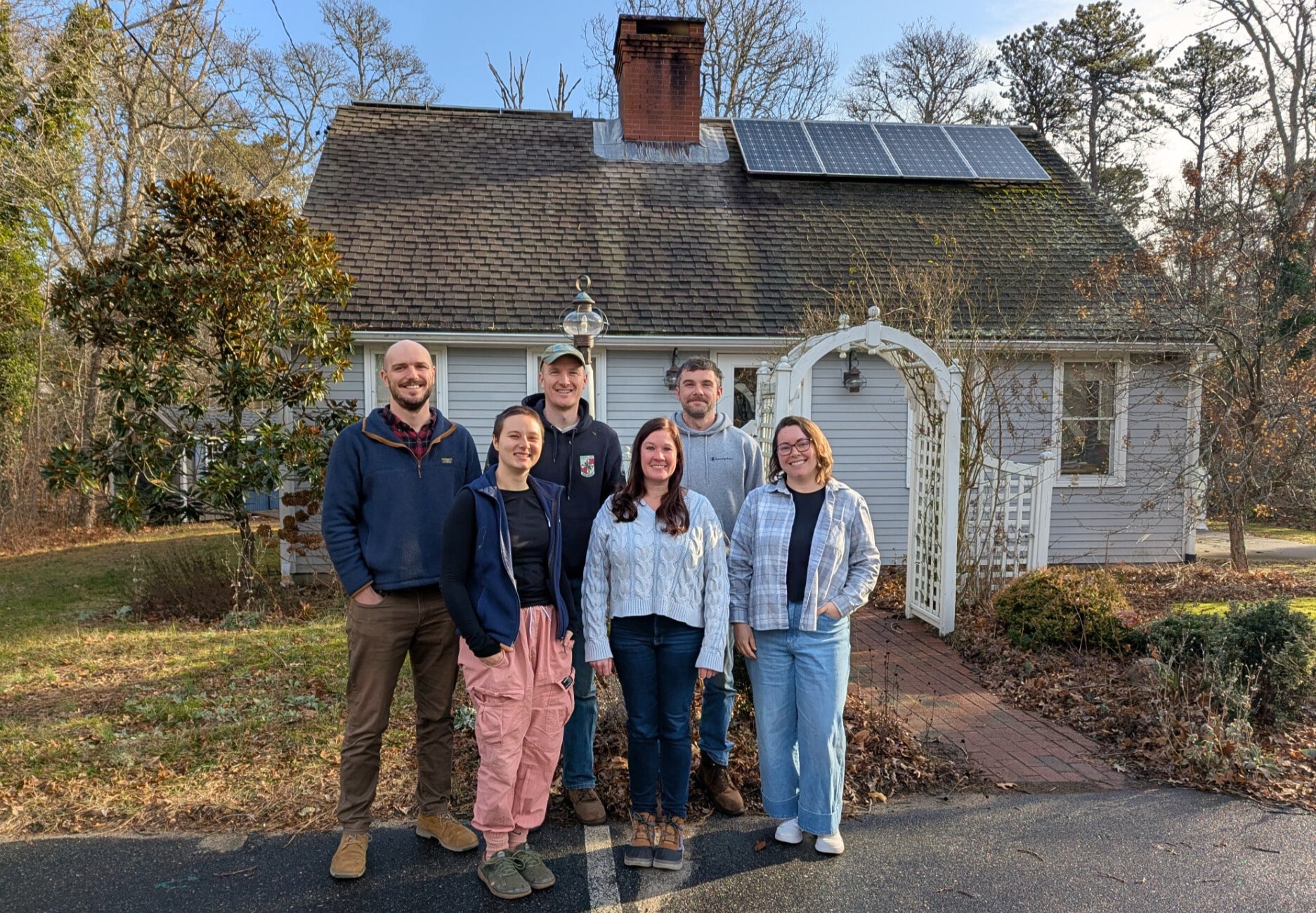 OCT staff and AmeriCorps Member in front of the office, December 2025.